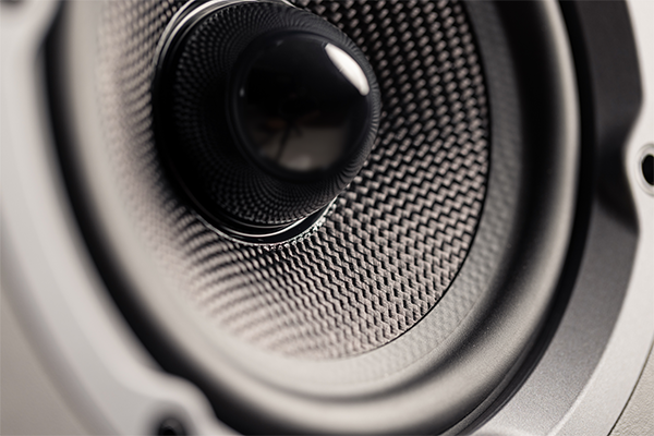 Up close of a mesh and plastic speaker