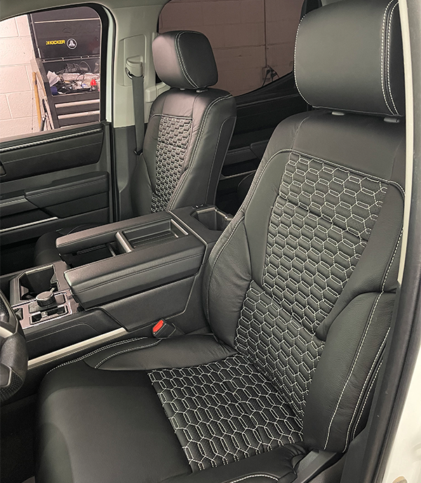 black leather seats with white stitching